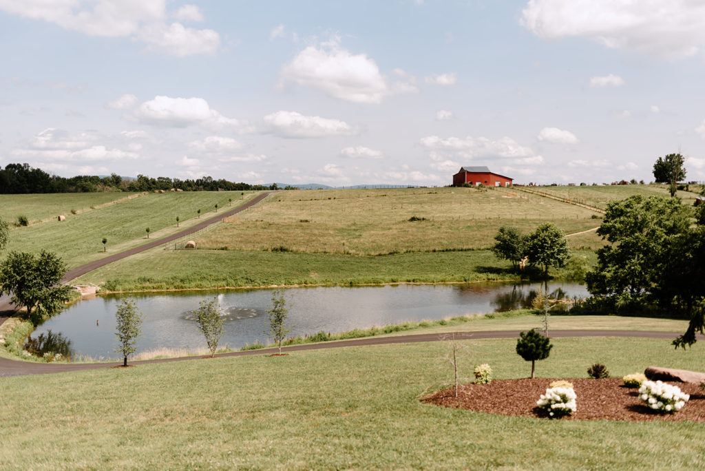 outdoor wedding venue in northern virginia with a lake and barn photographed by Charlottesville wedding photographer