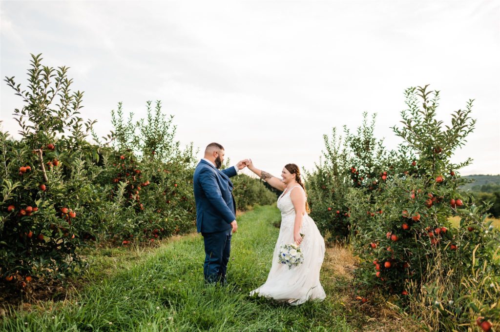 bride and groom dancing in their outdoor Virginia wedding venue photographed by Charlottesville wedding photographer