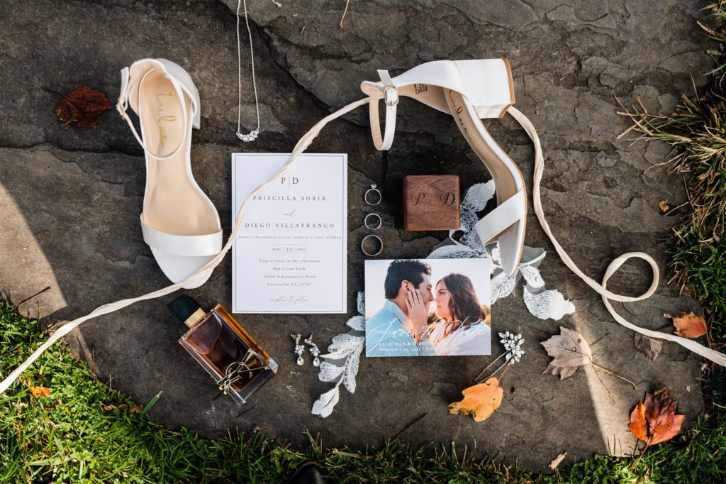 wedding details laying on a rock for outdoor Shenandoah wedding captured by Charlottesville wedding photographer 