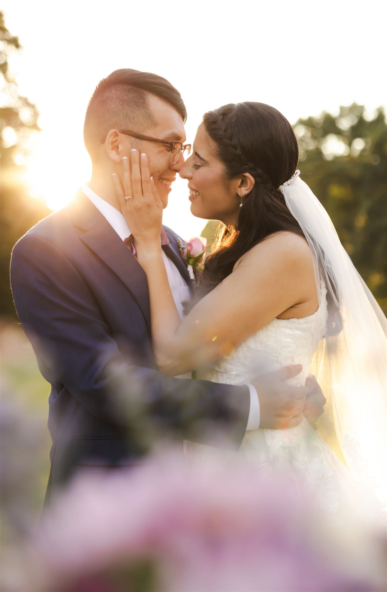 Richmond wedding photo with bride and groom embracing one another at sunset