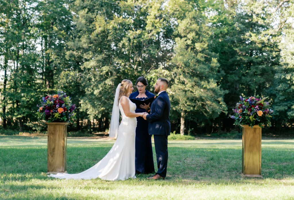 Bride's stepmom officiating wedding at Seven Spring's Pavilion